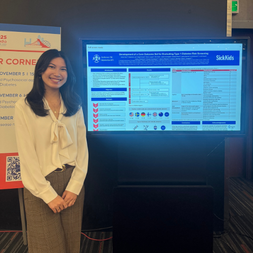 Celine Chen standing in front of her research poster at the ISPAD Conference